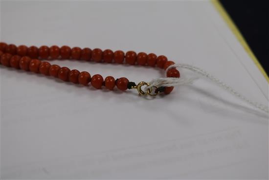 A single strand graduated coral bead necklace, 48cm.